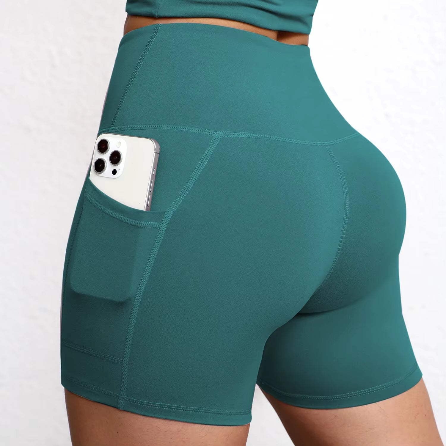 Elevate Your Workout with High Waist Yoga Shorts Featuring Utility Pockets and Butt Lifting Design