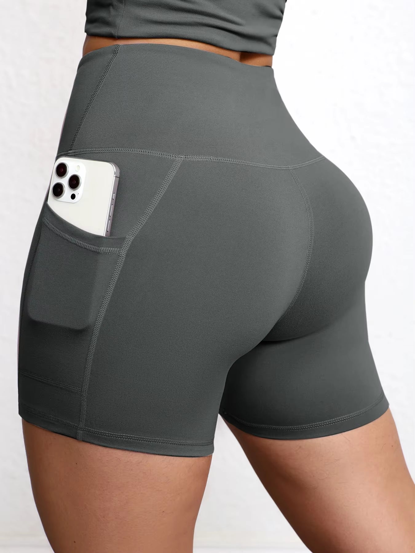 Elevate Your Workout with High Waist Yoga Shorts Featuring Utility Pockets and Butt Lifting Design