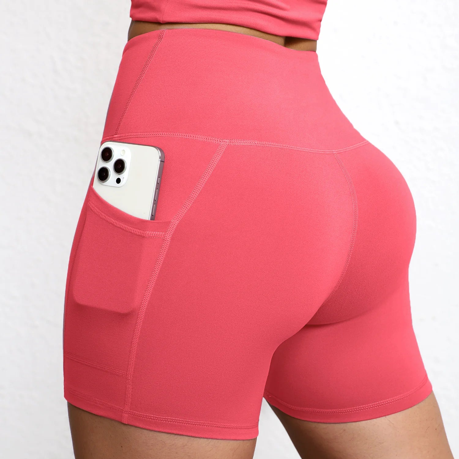 Elevate Your Workout with High Waist Yoga Shorts Featuring Utility Pockets and Butt Lifting Design