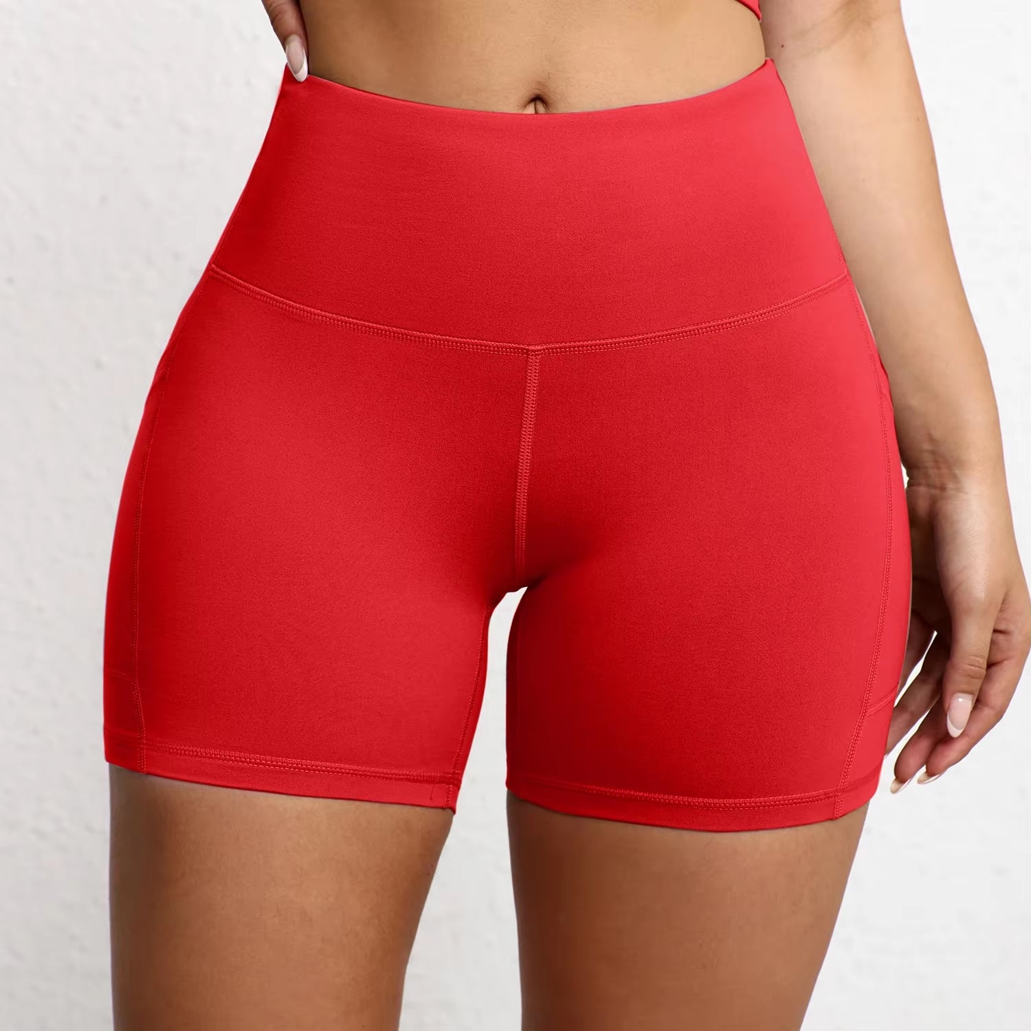 Elevate Your Workout with High Waist Yoga Shorts Featuring Utility Pockets and Butt Lifting Design