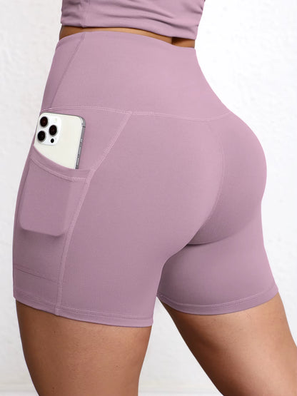 Elevate Your Workout with High Waist Yoga Shorts Featuring Utility Pockets and Butt Lifting Design