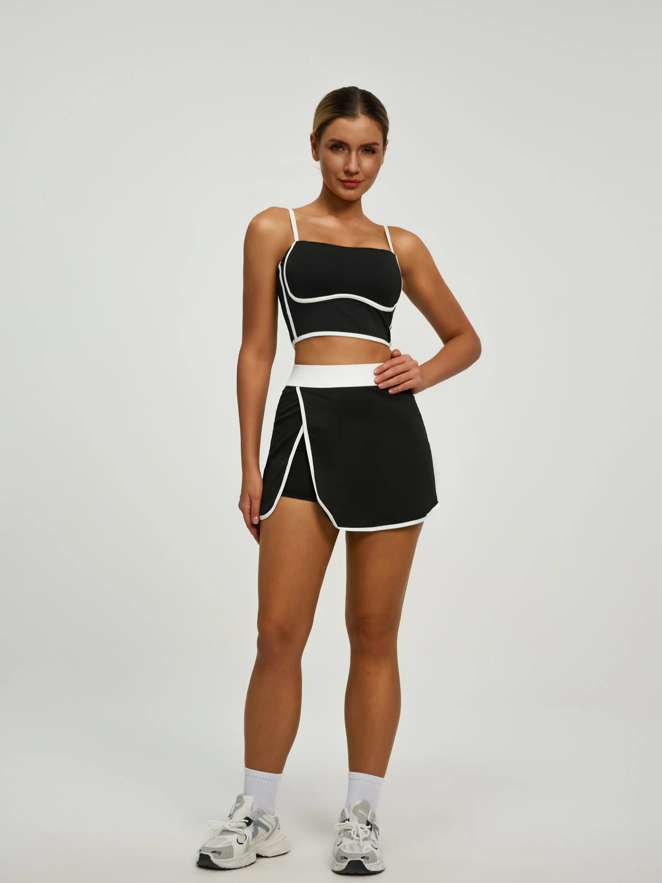 Elevate Your Workout with Our Women's Padded Crop Top and Skort Set - Featuring Hidden Pockets for Ultimate Convenience!