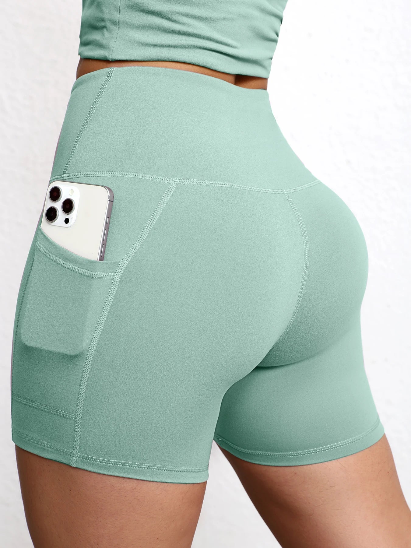 Elevate Your Workout with High Waist Yoga Shorts Featuring Utility Pockets and Butt Lifting Design
