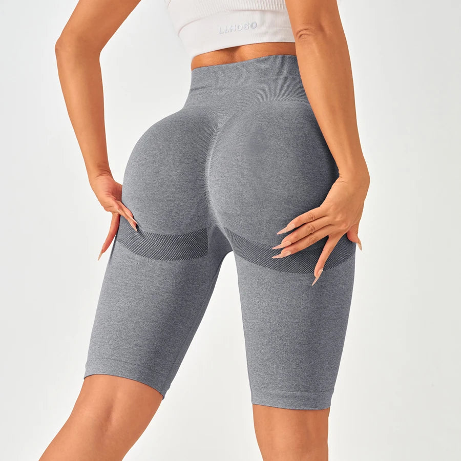 High-waisted seamless gray leggings showcasing a flattering butt-lifting design, perfect for stylish workouts.