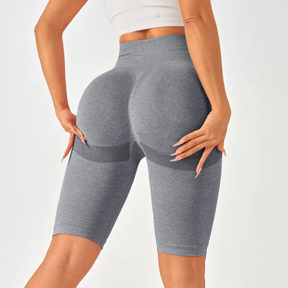 High-waisted seamless gray leggings showcasing a flattering butt-lifting design, perfect for stylish workouts.