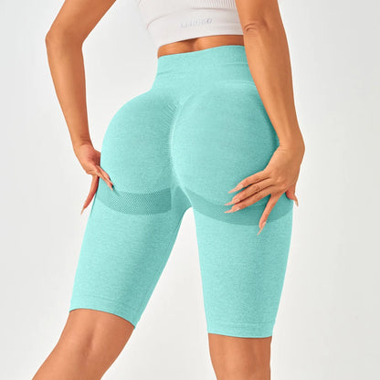 Light aqua high-waisted seamless leggings featuring a butt-lifting design and mesh-like side sections for elegance and comfort.