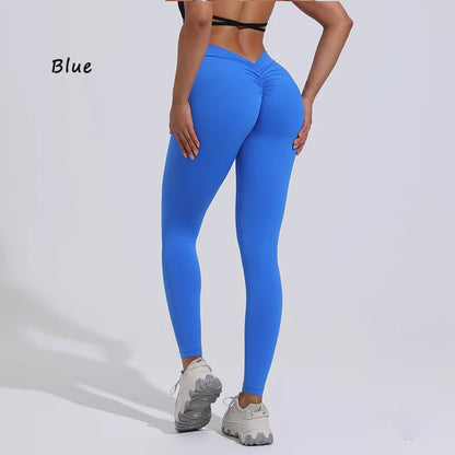 Bright blue women's yoga pants featuring a high waist design and gathered detail at the back for enhanced silhouette.