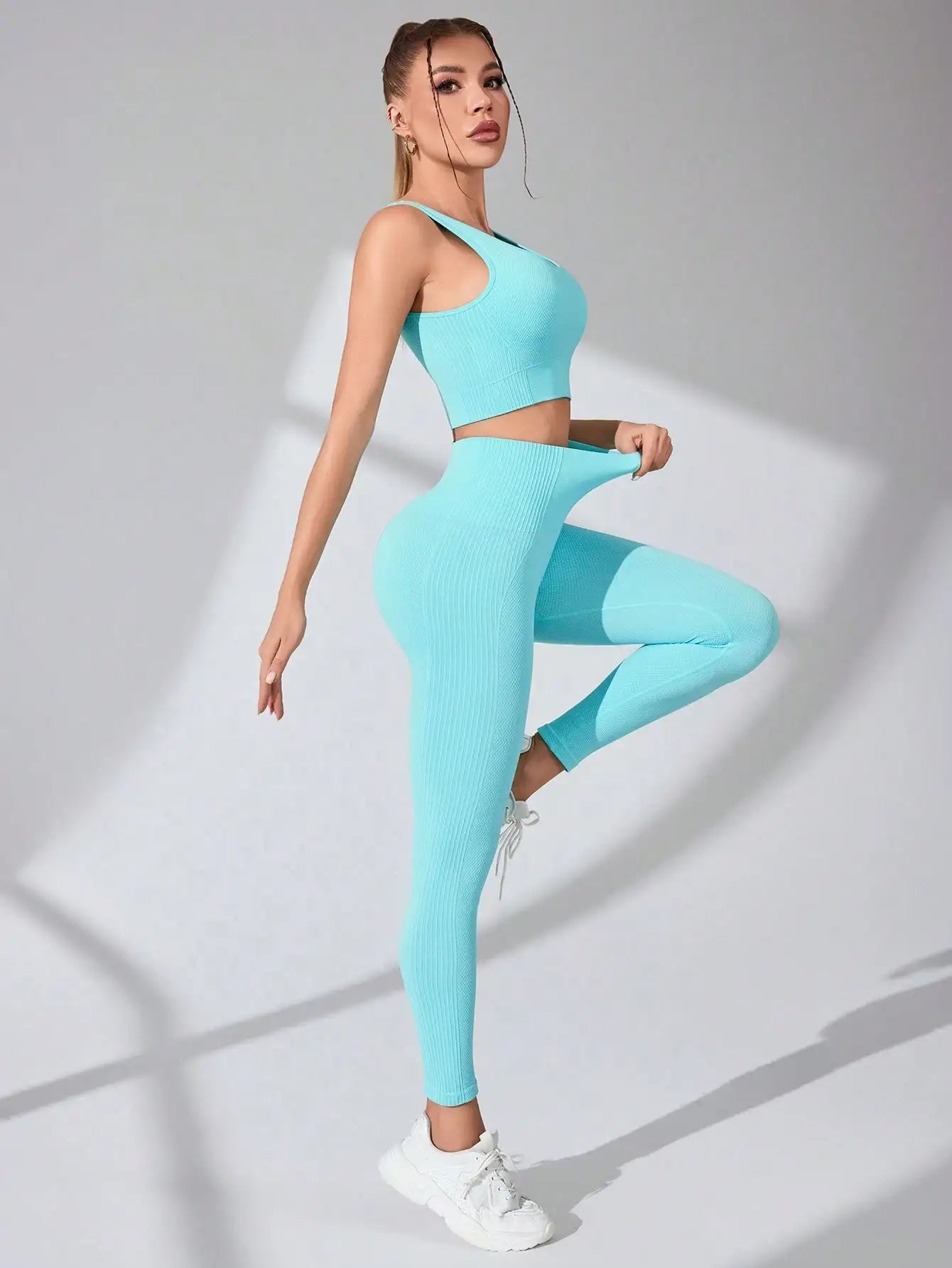 Elevate Your Workout with Our Women’s 2 Piece Seamless Yoga Leggings and Cross-Strap Sports Bra Set