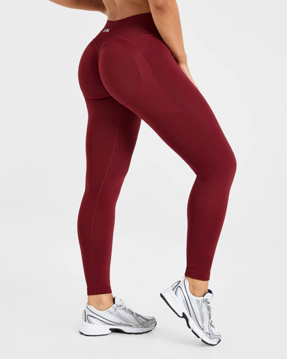 Burgundy Adapt Seamless Leggings with a low ribbed waistband and scrunch design, perfect for enhancing your workout style.