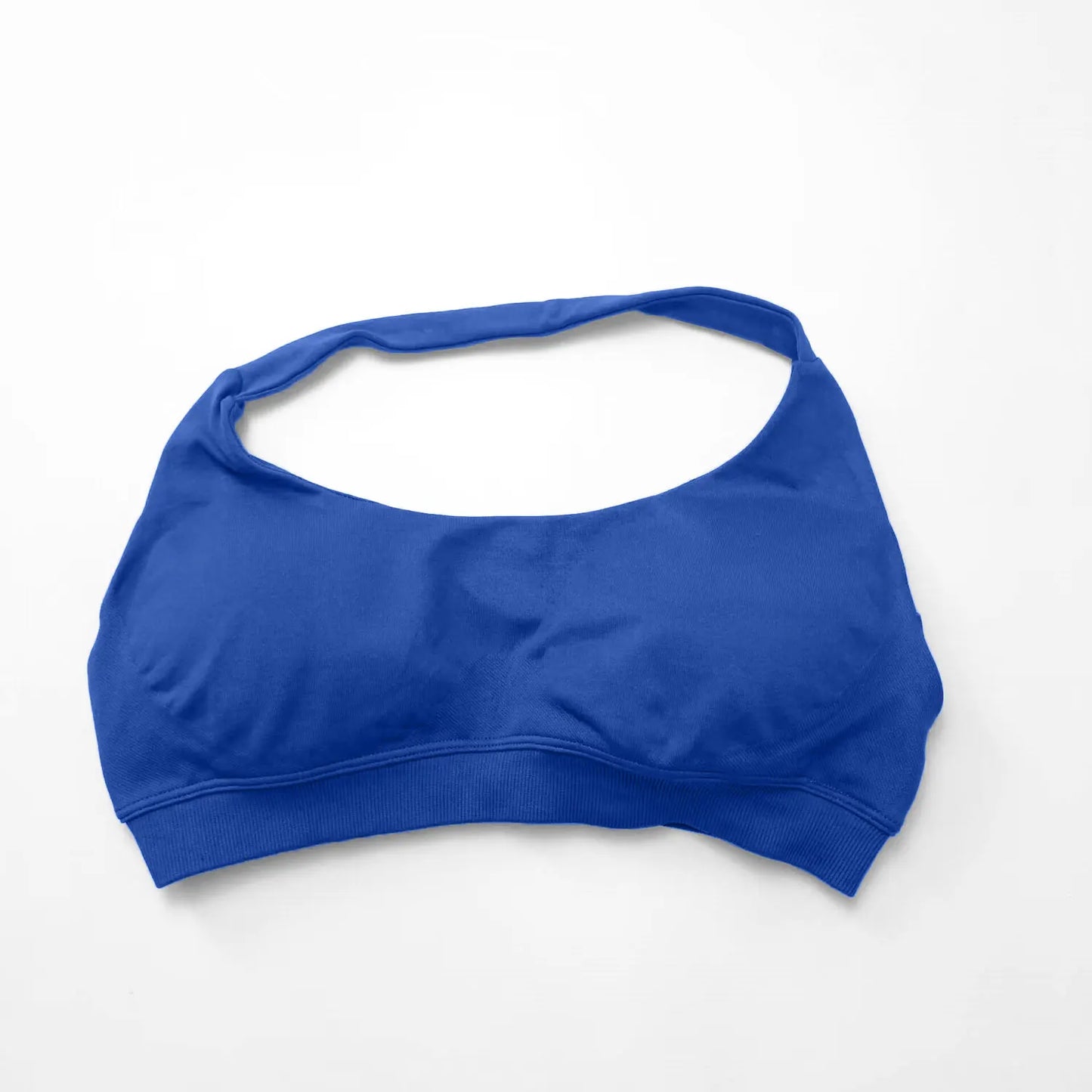 Blue seamless halter sports bra with an open-back design, featuring adjustable straps and a wide band for support.