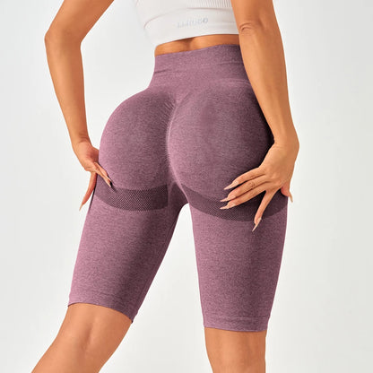 High-waisted seamless leggings in purple, featuring a flattering butt-lifting design, ideal for stylish workouts.