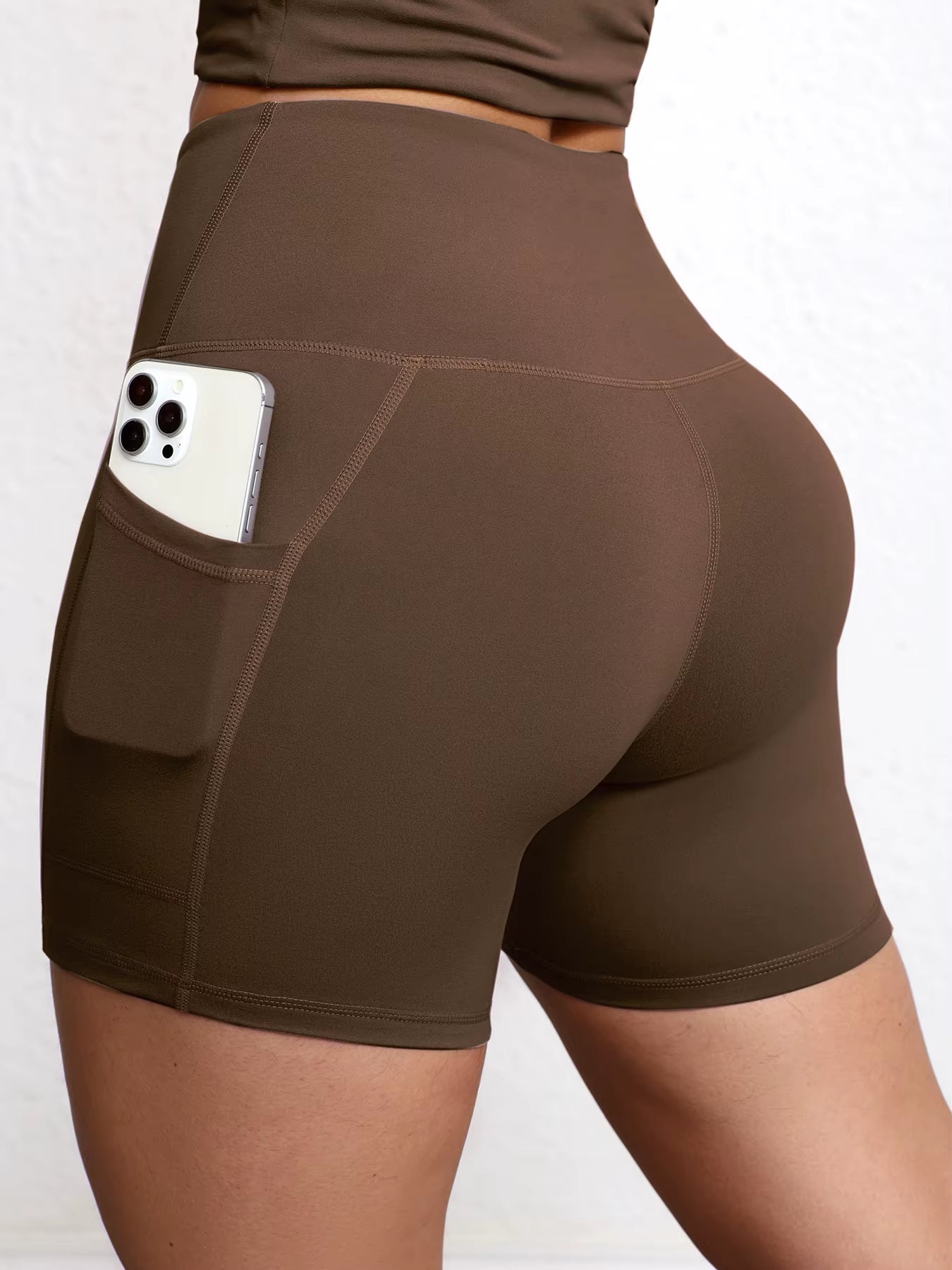 Elevate Your Workout with High Waist Yoga Shorts Featuring Utility Pockets and Butt Lifting Design