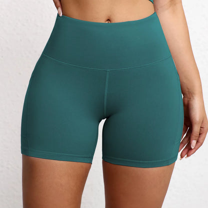 Elevate Your Workout with High Waist Yoga Shorts Featuring Utility Pockets and Butt Lifting Design