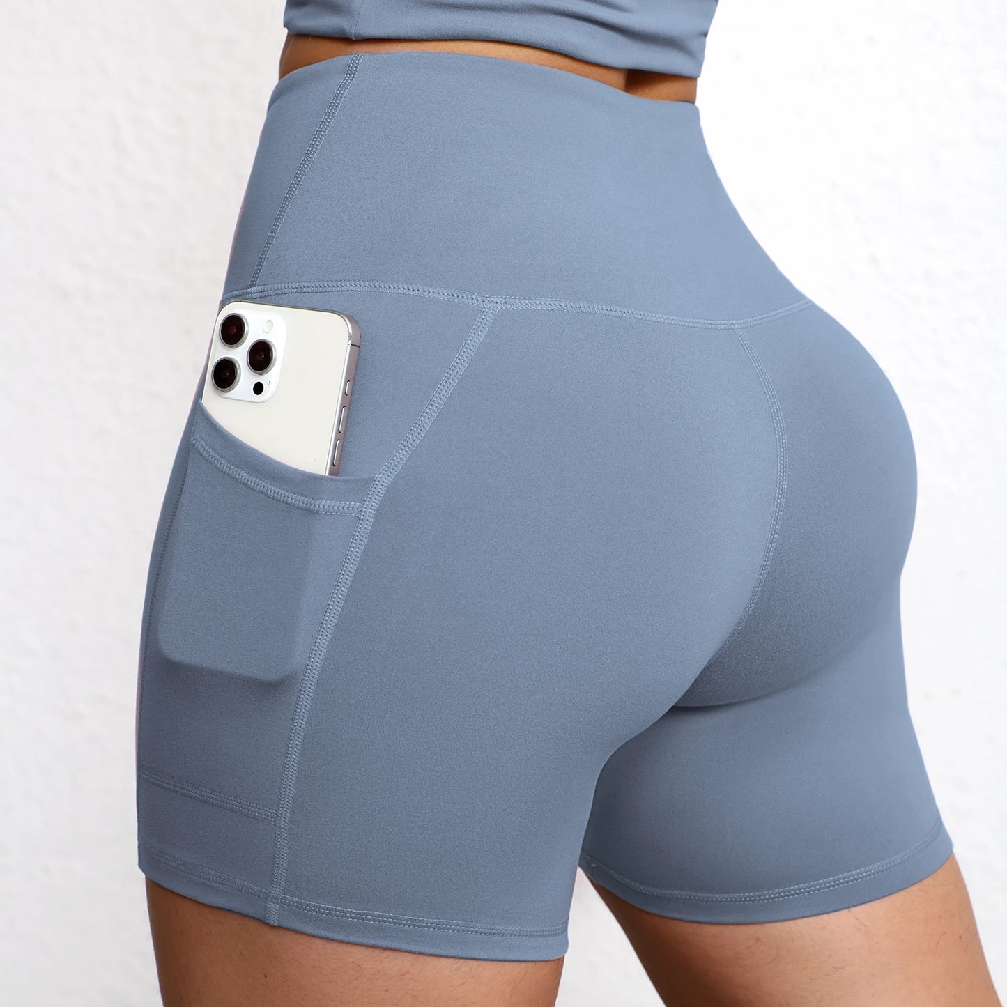 Elevate Your Workout with High Waist Yoga Shorts Featuring Utility Pockets and Butt Lifting Design
