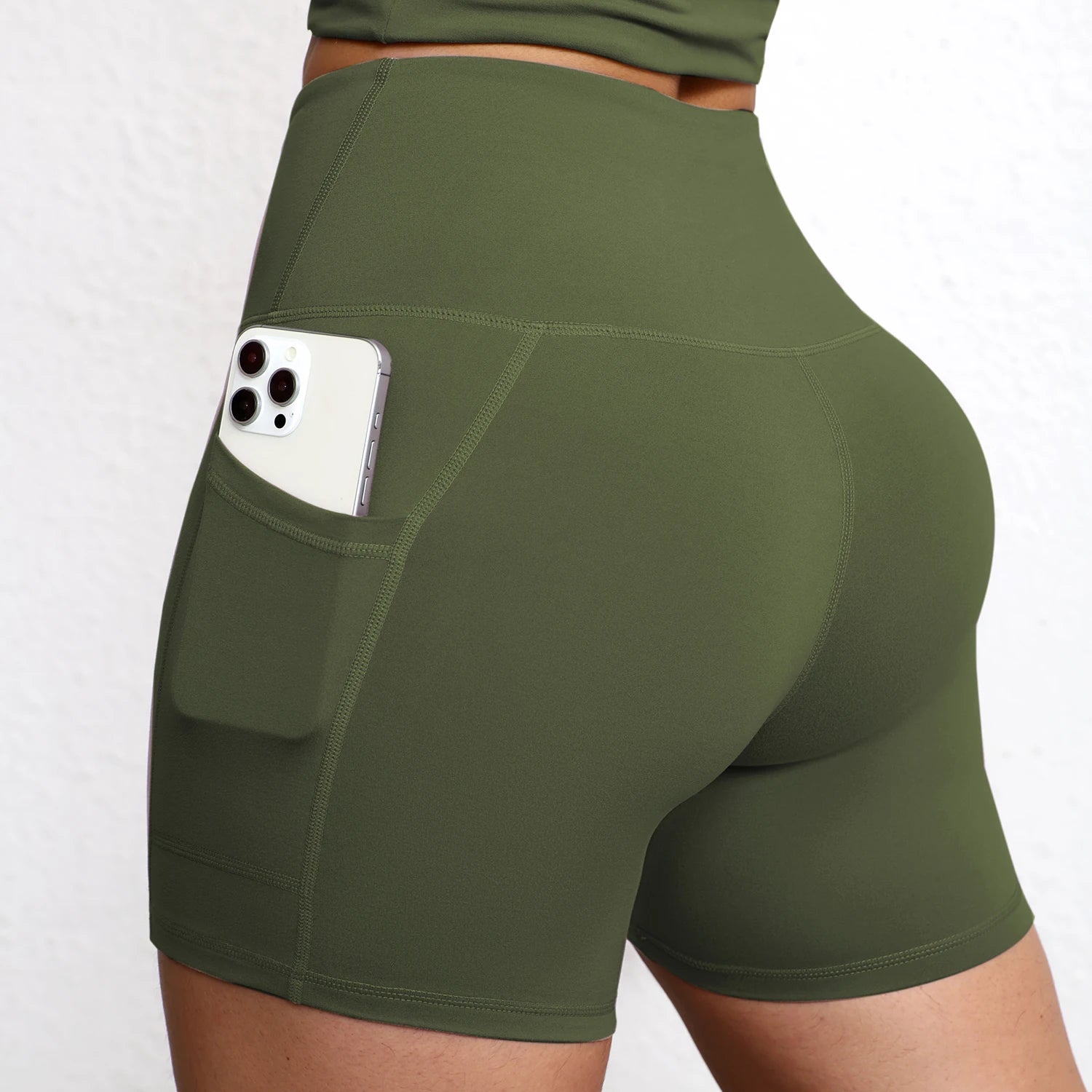 Elevate Your Workout with High Waist Yoga Shorts Featuring Utility Pockets and Butt Lifting Design