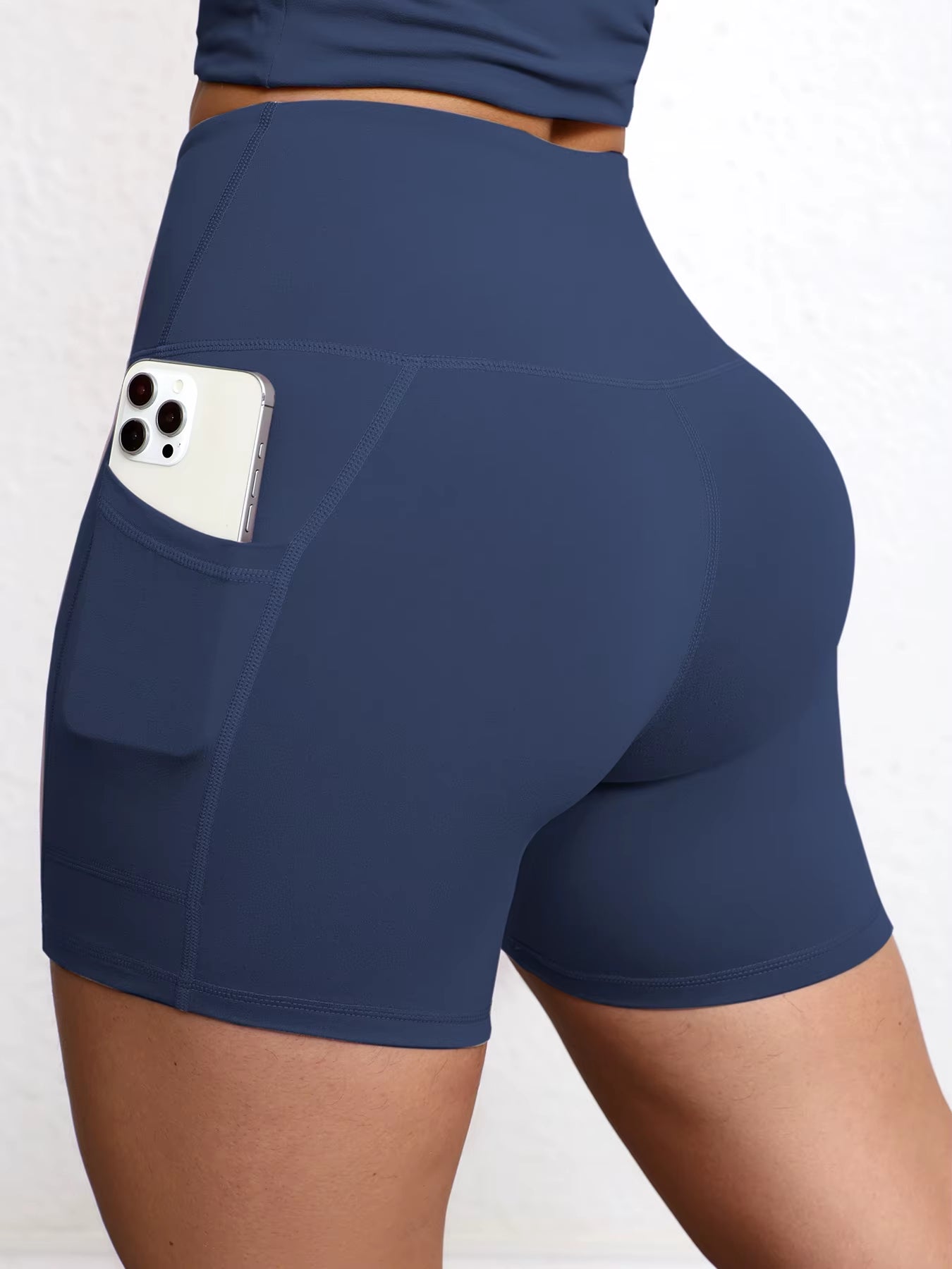 Elevate Your Workout with High Waist Yoga Shorts Featuring Utility Pockets and Butt Lifting Design